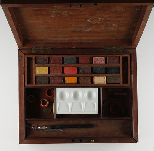 Paint box with lid open showing colours.