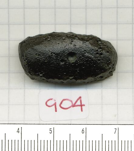 Oval-shaped tektite.