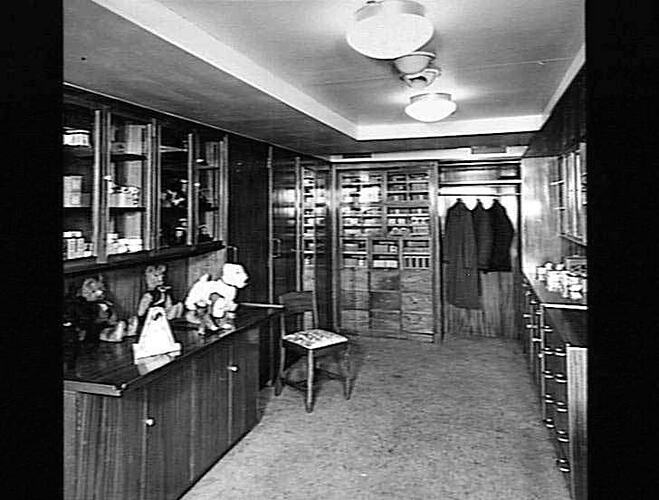 Ship interior. Ship shop with counter, shelves and displays.