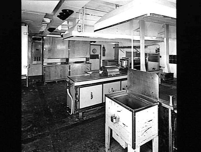 Ship interior. Restaurant kitchen. Metal benchtops and ovens.