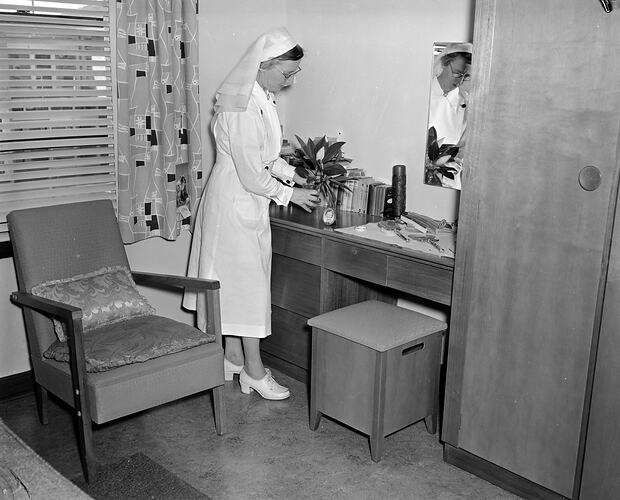 Nurse in a Bedroom, Melbourne, Victoria, Feb 1957