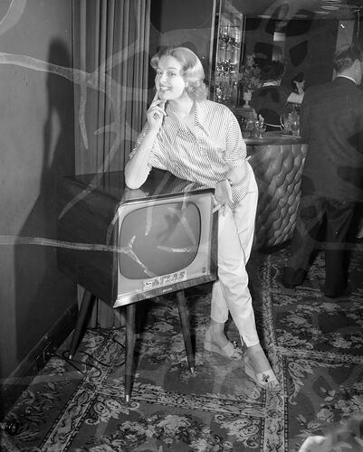 Woman with a Television Set, Melbourne, Victoria, Sep 1957
