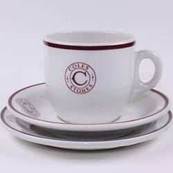 Ceramic cup, saucer, plate with Coles Stores logo.
