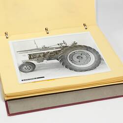 Photograph Album of harvesting equipment.