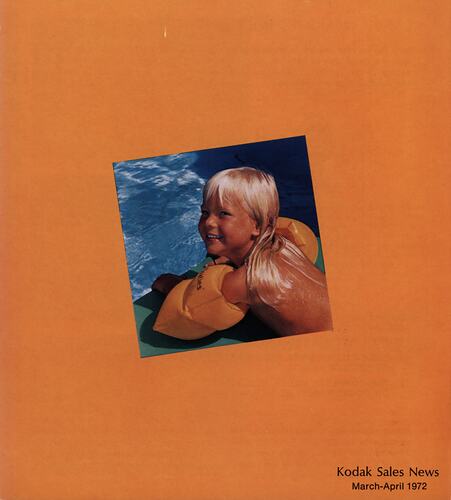 Magazine cover featuring photograph of girl at poolside.
