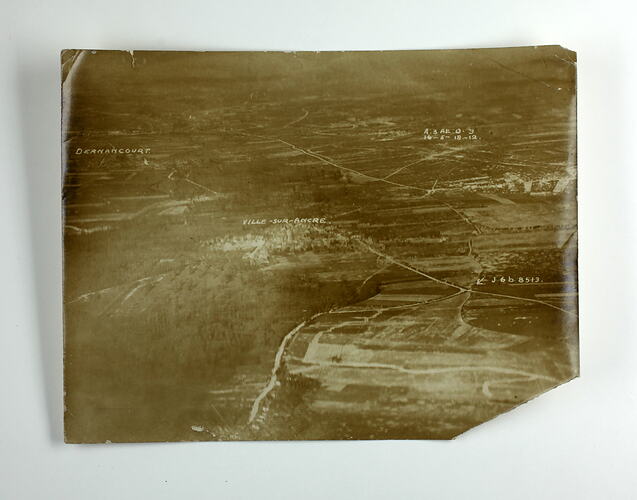 Front of aerial photograph with inscriptions.
