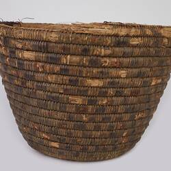 Woven fibre round basket, no lid.