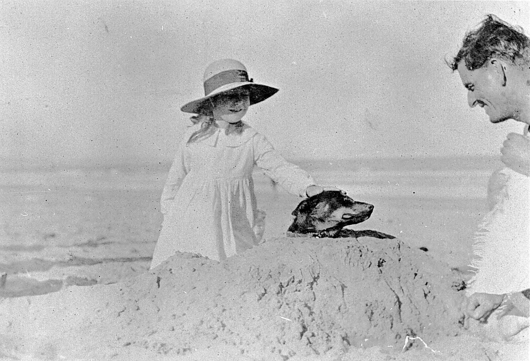 Negative - Girl Petting a Dog on the Beach, Lorne, Victoria, 1920