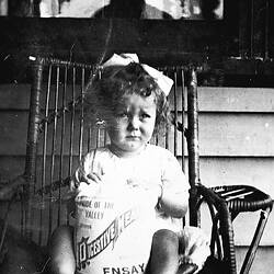Negative - 'Pride of the Valley', Potrait of Child with Bag of Digestive Meal, Ensay, Victoria, circa 1920