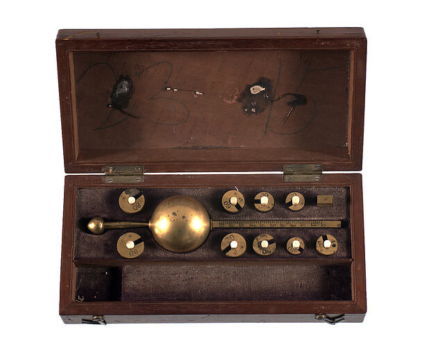 Brass instrument and fittings in wooden case.
