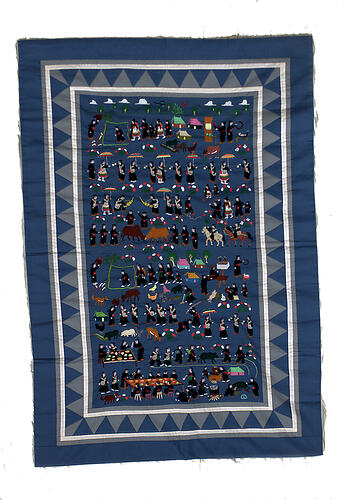 Blue rectangular fabric with embroidered people and animals.