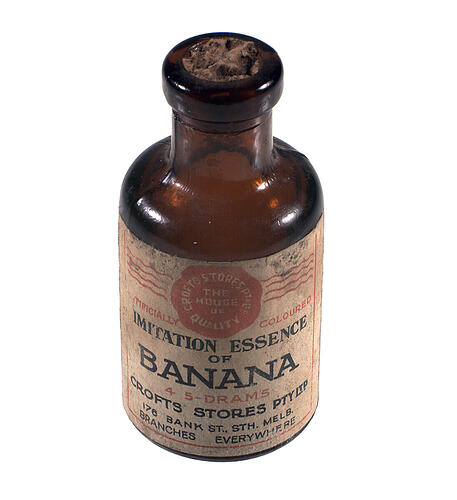 Brown glass bottle with label.