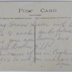Back of postcard with handwriting.