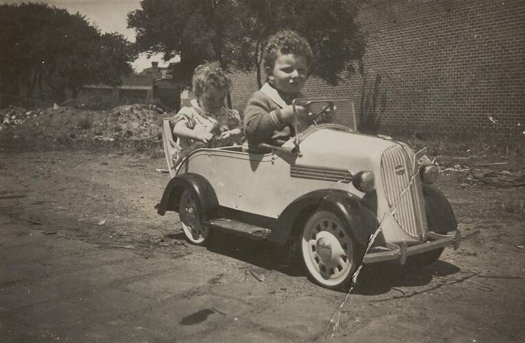 Digital Photograph - Boy & Girl in Toy Car, Third Birthday, Parkdale, 1939