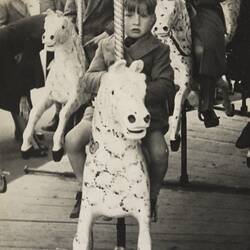 Boy Riding Merry Go Round at Luna Park, St Kilda, 1940-1949