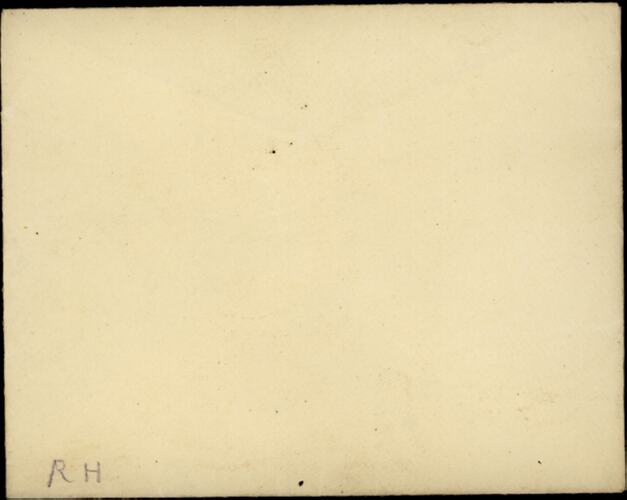 Blank envelope with intials in corner.