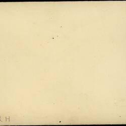 Blank envelope with intials in corner.