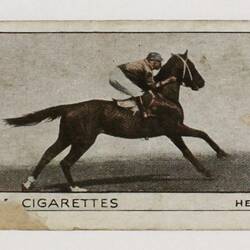 Cigarette Card depicting a jockey riding a horse