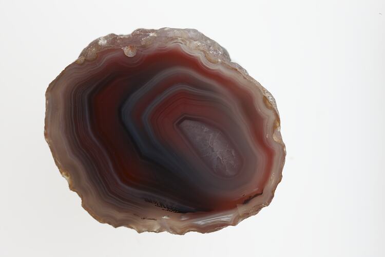 Agate of red, blue and cream bands.
