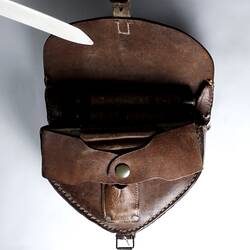 Leather case, with front flap opened.