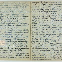 Open book, 2 cream pages with faint grid pattern. Cursive handwritten text in blue ink. Page 8 and 9.