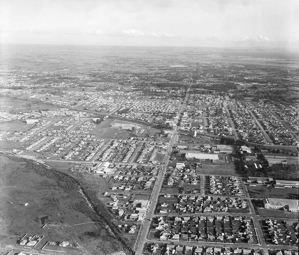 Monochrome aerial image of a suburb.
