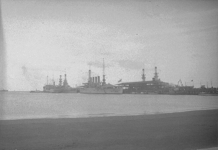 Monochrome negative of battleships.