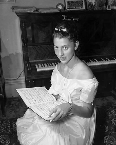 Woman with Sheet Music, Richmond, Victoria, 13 Jan 1960