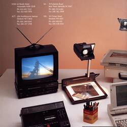 Back cover page with photograph of audiovisual equipment.