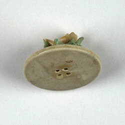 Toy plate of flowers, underside.