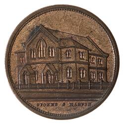 Round medal with Wesleyan church.