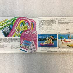 Open leaflet with colourful cover featuring Barbie dolls.