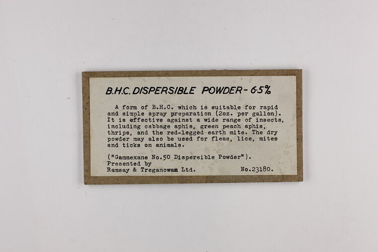 White rectangular label with black text and brown border.