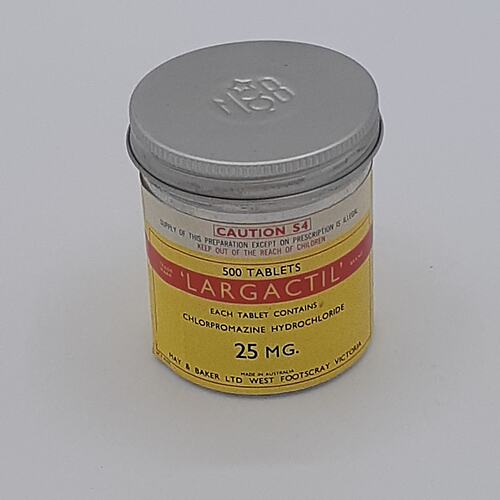 Metal round container with yellow, red and white paper label.