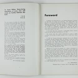 Open booklet with white pages and black printing.