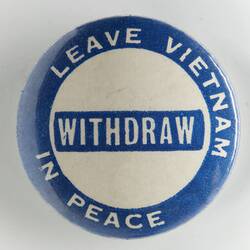 Round blue and white badge with white text.