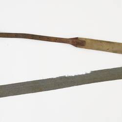 Surcingle is made from blue hessian webbing with four inches of elastic before the strap, with a long leather fastening strap.