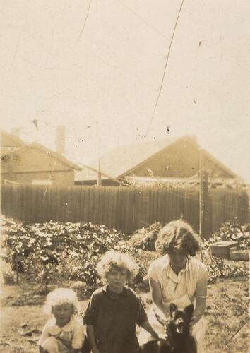 Digital Photograph - Family in Backyard with Vegetable Patch & 'Stink Pipe', Brunswick, circa 1928