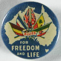 Front of badge with Australia outline and flags.