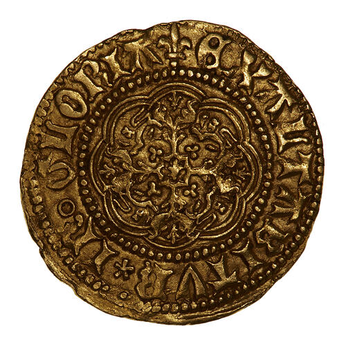 Coin, round, at centre a floriated cross, in each angle, a Lion passant below a crown; text around.