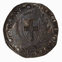 Coin, round, Within a wreath of palm and laurel a shield bearing the cross of St. George; text around.