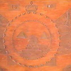 Detail of carving on wooden tray.
