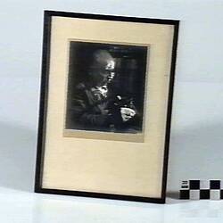 Framed photo of a man.