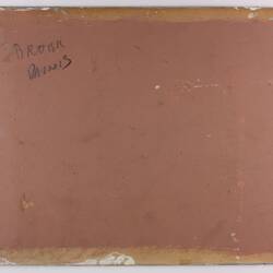 Painted dark pink rectangular card. Back of title card.