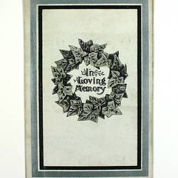 Card with text suronded by wreath and grey border.