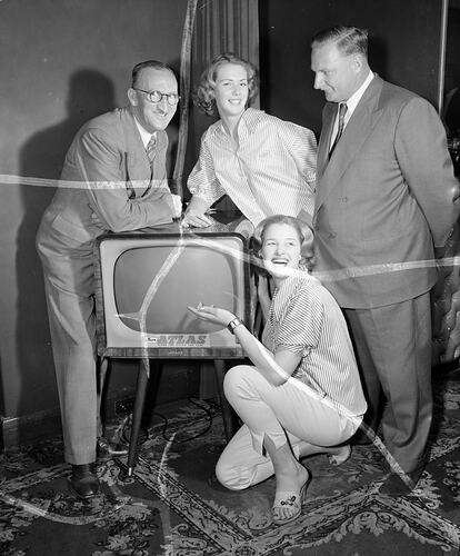 Two Women and Two Men with a Television Set, Melbourne, Victoria, Sep 1957
