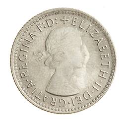 Round silver coin.