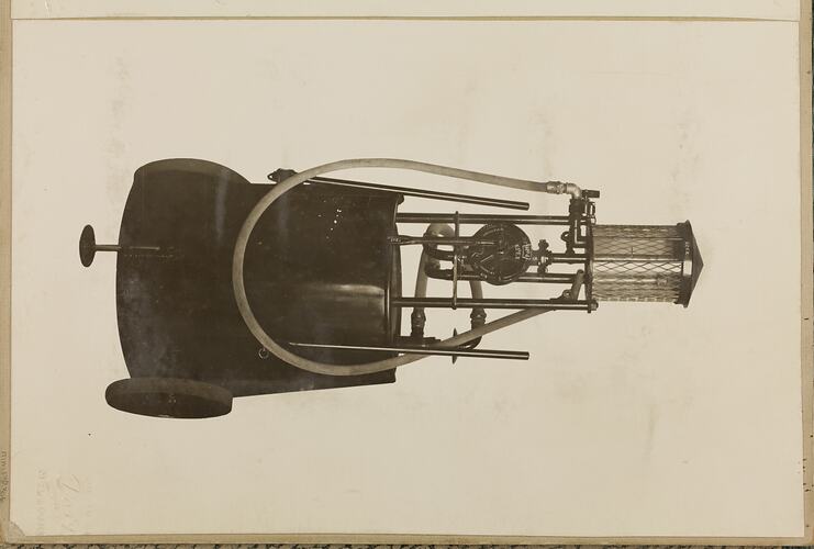 Monochrome photograph of a portable petrol measure.