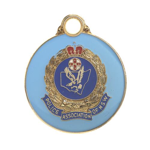 Enamel badge.