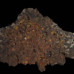 Flat orange-brown rock.